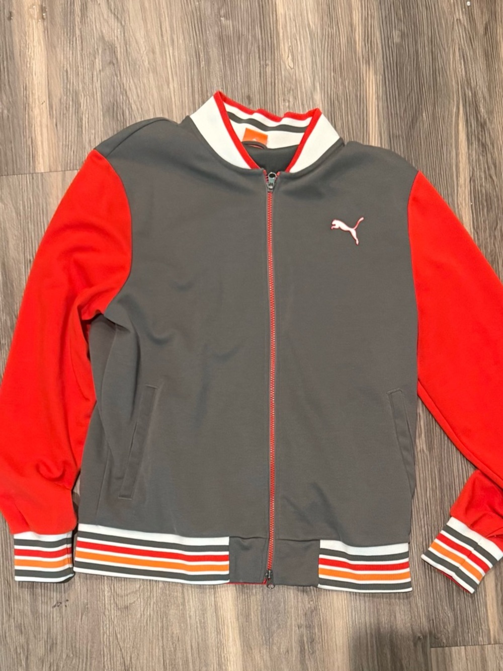 Puma Gray Jacket with Red Accents and Red Trim
